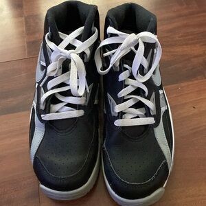 Nike Air Size 7Y black, gray and white.  Used but good condition.  Leather
